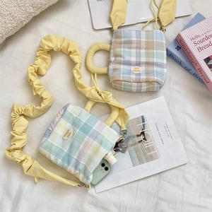 Cute checkered water bottle bag with ruffled strap for crossbody or handheld style