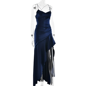 Detail view of navy blue satin slip dress with ruffled hem and sexy high slit feature