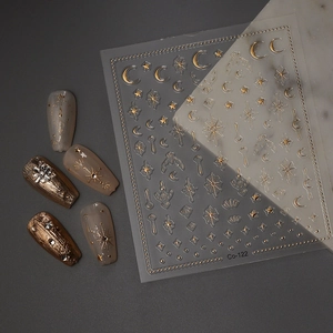 Golden celestial nail stickers featuring moon, stars and sunburst designs for DIY manicures