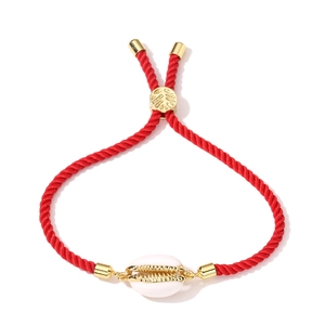 Adjustable red braided rope bracelet with a white shell charm and golden metal accents