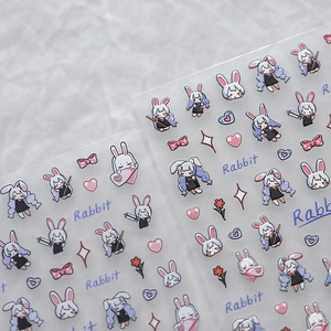 Cute cartoon rabbit nail art stickers with heart and bow designs for DIY manicure decor