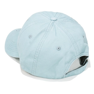 Detail view of the adjustable back strap and cotton stitching on a light blue baseball cap