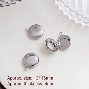 Polished silver locket pendant detail showing open structure and 13x16mm dimensions