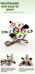 Detail of dog football toy showing inflation process and durable nylon grab tabs