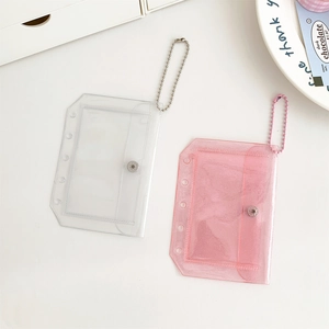 Clear and glitter pink PVC button card holders with bead chains and 6-ring binder holes