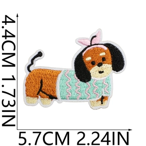 Cute dachshund dog embroidery patch with pink bow and dimensions of 5.7x4.4cm