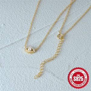 Minimalist S925 sterling silver evil eye necklace with pearl and gold finish
