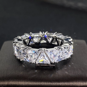 Close-up of luxury titanium ring with full triangle-cut zircon pavé setting for women