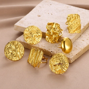 Set of 18K gold titanium steel rings with lava texture and hammered designs for women