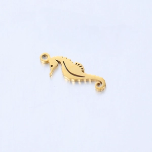 Detailed view of polished golden seahorse charm pendant for DIY jewelry making