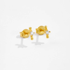Macro detail of S925 sterling silver stamp on golden cross stud earrings with zircon