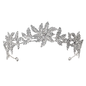 Silver bridal tiara crown with floral rhinestones on white background for princess weddings