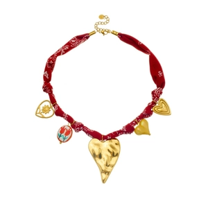 Ethnic style heart pendant necklace with red fabric ribbon and gold plated accents