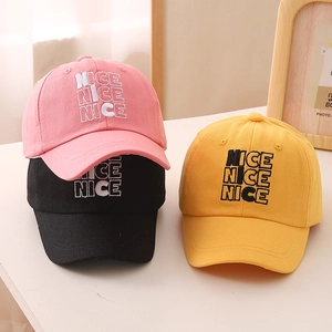 Embroidered cotton baseball caps for kids in pink, black, and yellow for sun protection