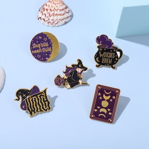 Set of 5 purple and gold witch enamel pins featuring moon, potion, and broom designs