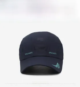 Close-up of lightweight navy blue sports cap with laser-perforated holes for breathability