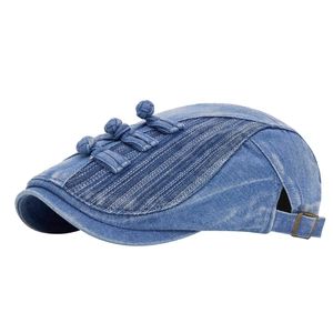 Light blue denim ivy cap featuring traditional frog buttons and adjustable side buckles