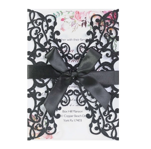 Elegant dark green glitter laser-cut wedding invitation with black ribbon and floral card