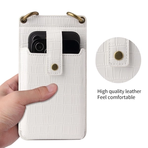 Detail of white crocodile pattern phone bag with metal ring and snap button closure
