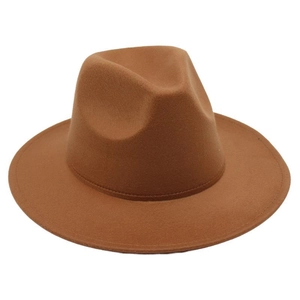 Detailed view of a brown wool fedora hat with a wide brim and classic pinched crown