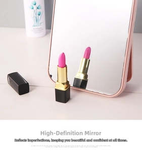 Detail of rose gold folding desktop makeup mirror with high-definition glass surface