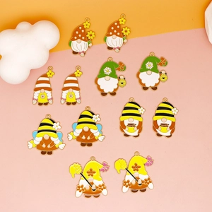 Detailed set of 12 enamel honey bee gnome charms for DIY jewelry making and pendants
