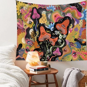 Bedroom wall decor featuring a psychedelic tapestry hanging above a white bed and nightstand