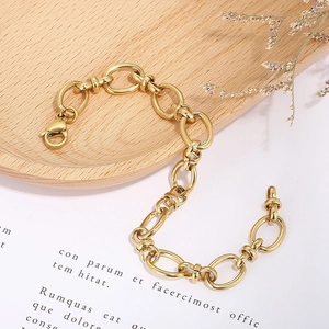 Minimalist gold knot chain bracelet in stainless steel with hollow oval links