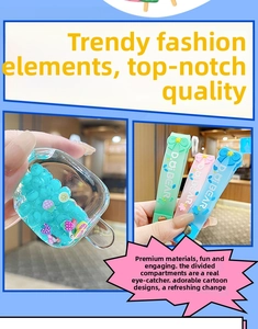 Detail of popsicle keychain featuring colorful beads and fruit slices in liquid filling
