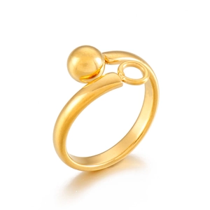 Minimalist gold stainless steel ring with sphere and hanging hoop on a white background