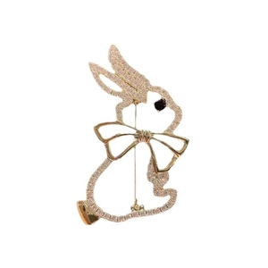 Elegant gold rabbit brooch with sparkling rhinestones and a delicate bow detail