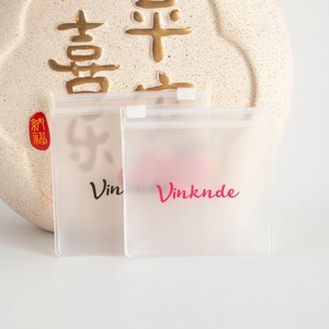 Close-up of frosted EVA jewelry storage bags with slide zipper and logo prints