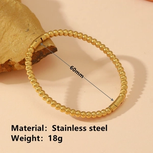 Golden stainless steel beaded bracelet with buckle and 60mm diameter specifications