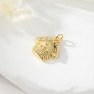 14K gold filled cupcake pendant charm with metallic luster on white stone base