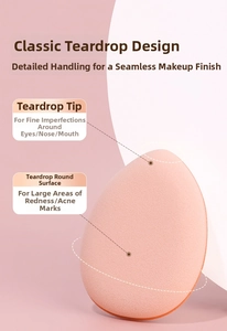 Detail of pink mini finger puff sponge showing the teardrop tip and soft porous texture