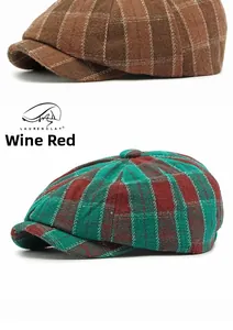Detailed view of vintage plaid newsboy caps in brown and red-green checkered wool blend