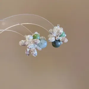 Elegant floral stud earrings with agate beads and pearls on a silver needle base