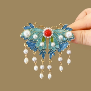 Exquisite butterfly brooch with golden filigree enamel, pearls and red agate bead