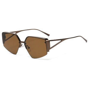 Detail of bronze metal hollow triangle temples and geometric lens on half-frame sunglasses