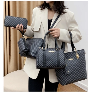 Detailed six-piece handbag set featuring grey geometric print tote and matching pouches