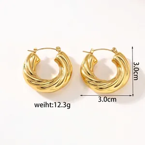 Close-up of 3.0cm gold twisted rope hoop earrings in 18k plated stainless steel