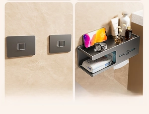 Detail of wall-mounted tissue box installation steps showing adhesive backing and final setup