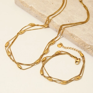 Ensemble élégant de collier et bracelet multicouches en acier inoxydable doré à billes