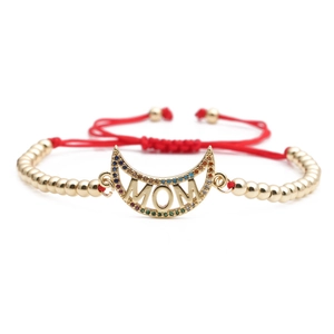 Adjustable golden MOM moon bracelet with colorful zircons and red woven cord