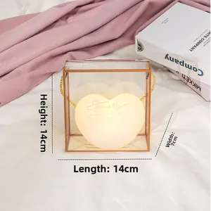 Detail of heart-shaped decorative gift box lamp with handle, measuring 14x14x7cm