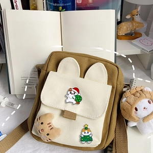 Japanese style canvas crossbody bag with cute Christmas cat badges and plush charm