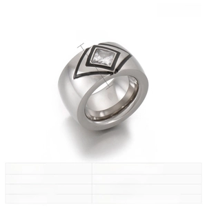 Detail of 14mm wide stainless steel ring with black epoxy inlay and square zircon stone