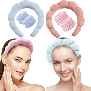 Detailed views of blue and pink plush headband and wristband sets for washing face