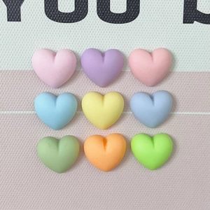 3x3 grid of colorful matte resin heart charms for DIY phone cases and hair accessories