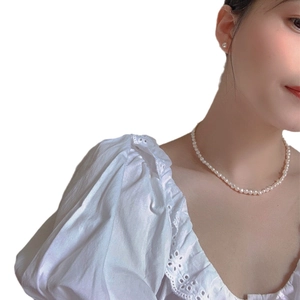 Baroque freshwater pearl necklace with irregular pearls and matching stud earrings